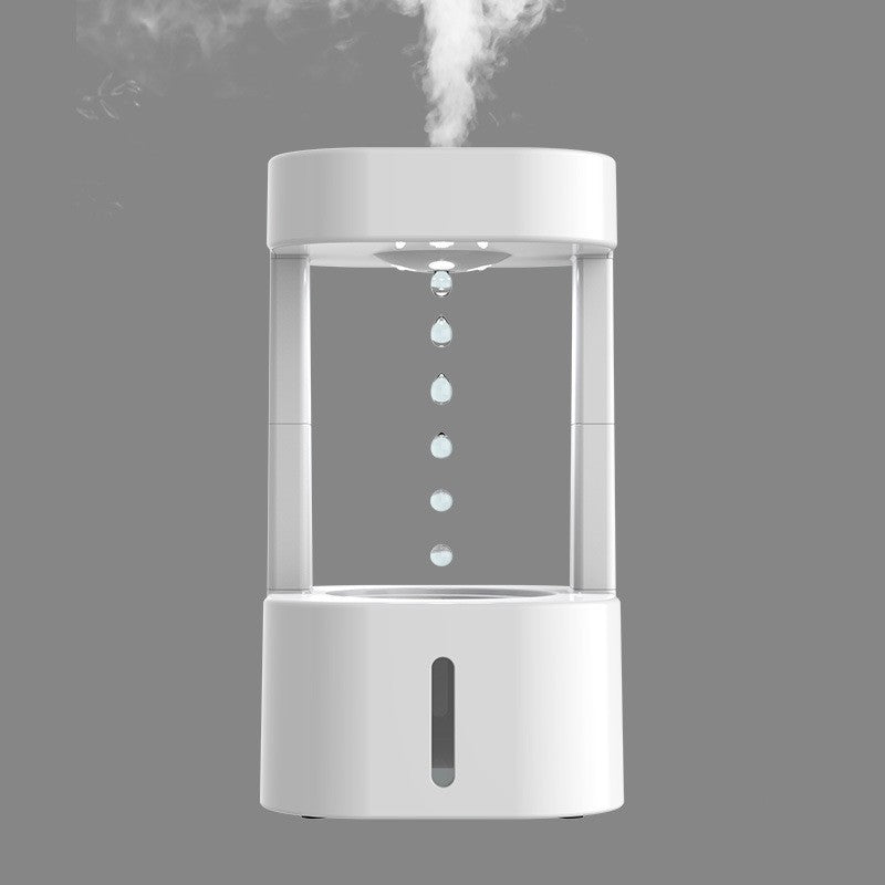a white device with steam coming out of it