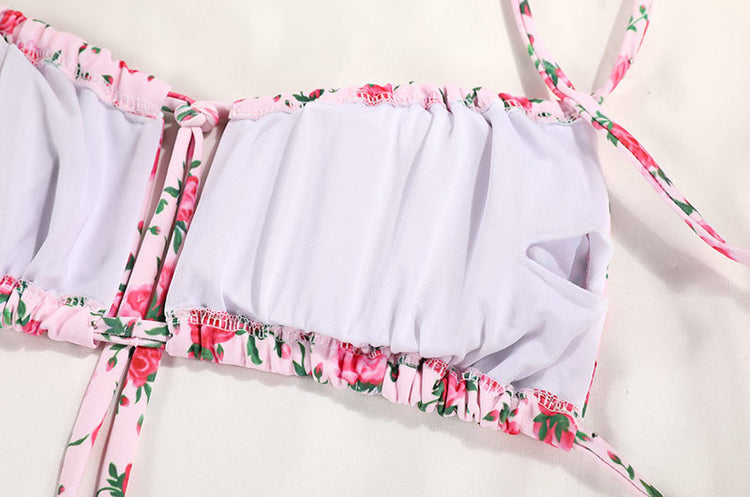 a pink and white garment top