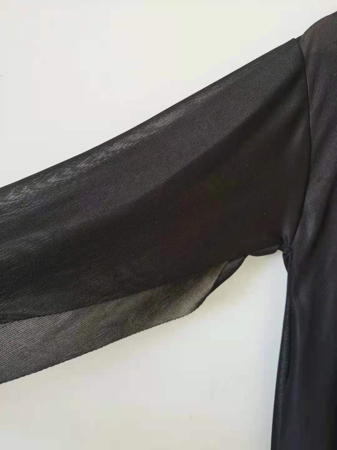 a black fabric on a white background
