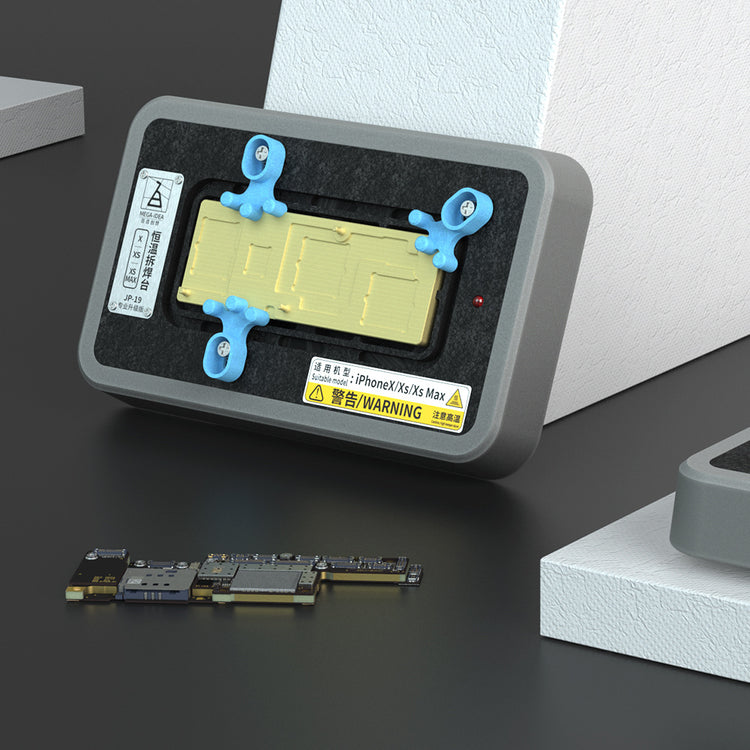 a rectangular object with a yellow label on it next to several small objects