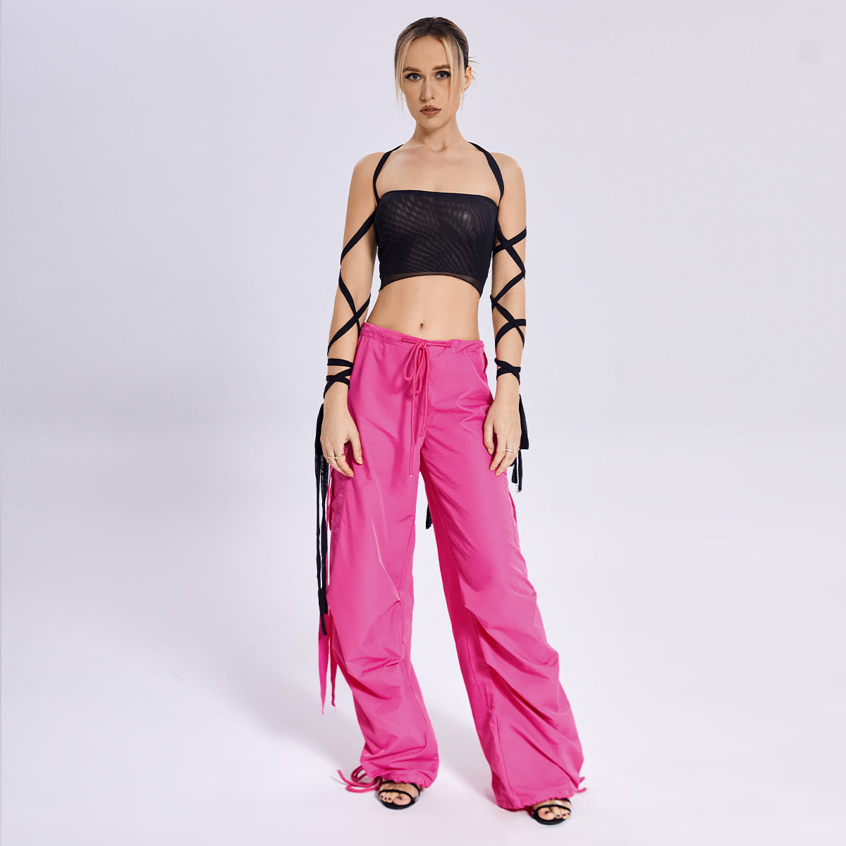 a woman in pink pants