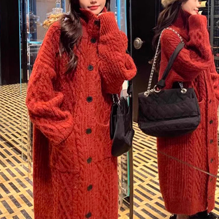 a woman in a red sweater and hat