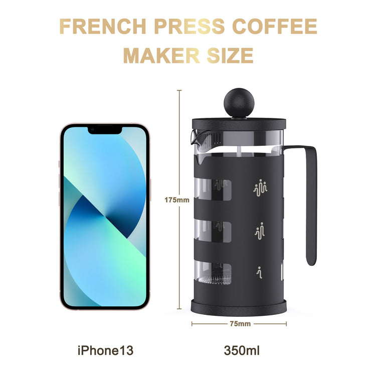 a phone next to a french press