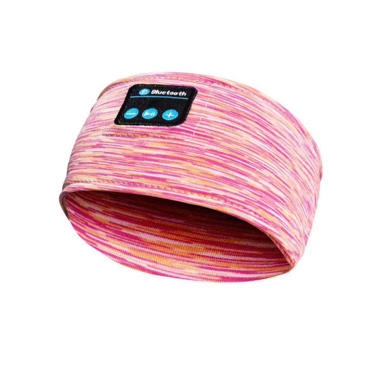 a pink and yellow headband with buttons