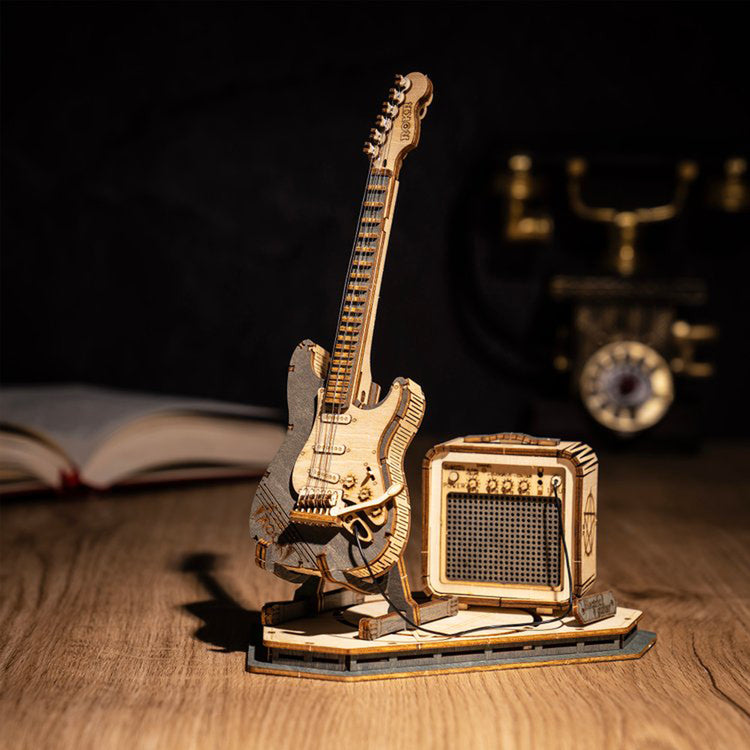 a guitar and amplifier on a table