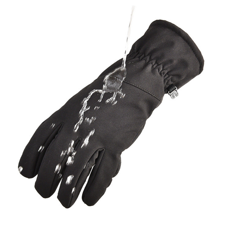 a black glove with water coming out of it