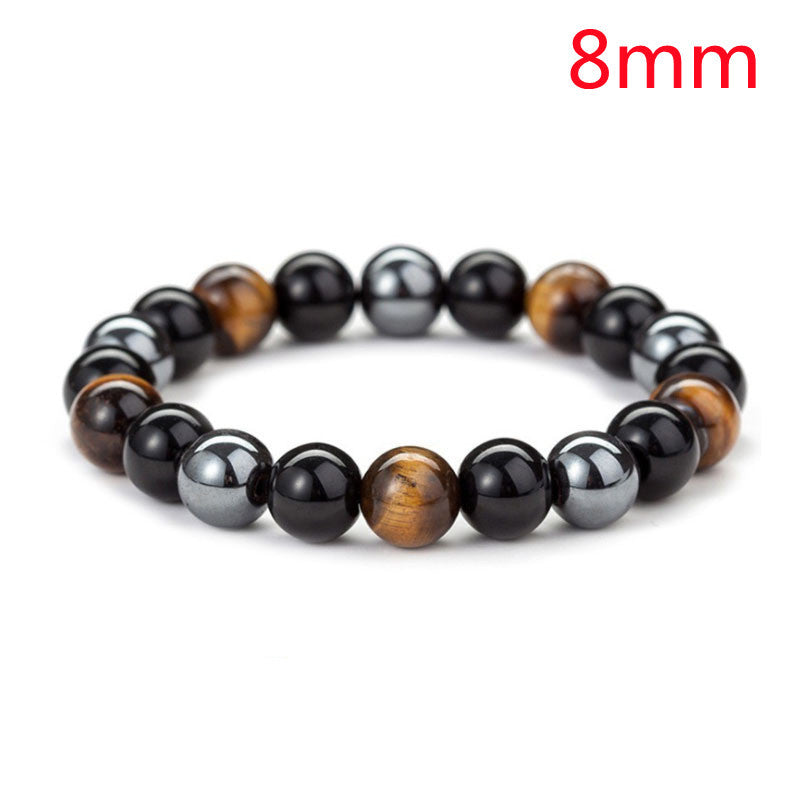 a bracelet with black and brown beads