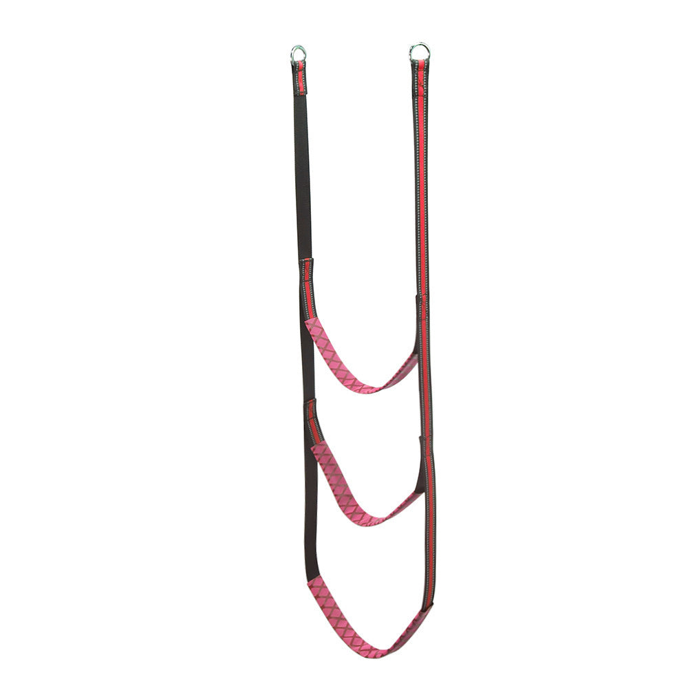 a pink and black harness