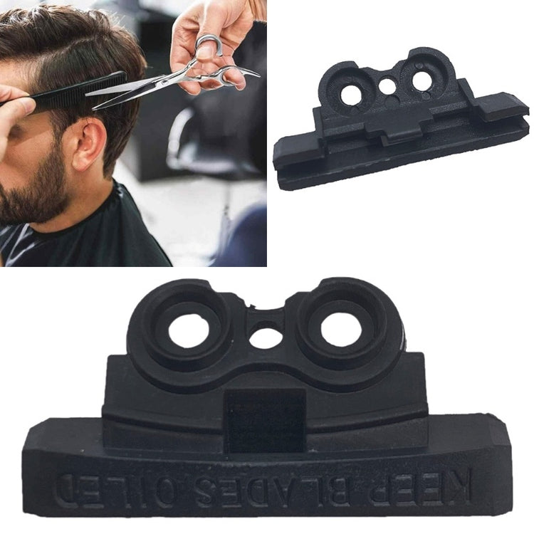 a man cutting his hair with scissors