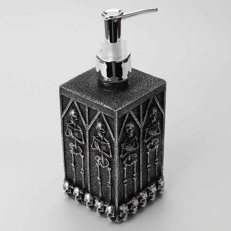 a black and silver soap dispenser