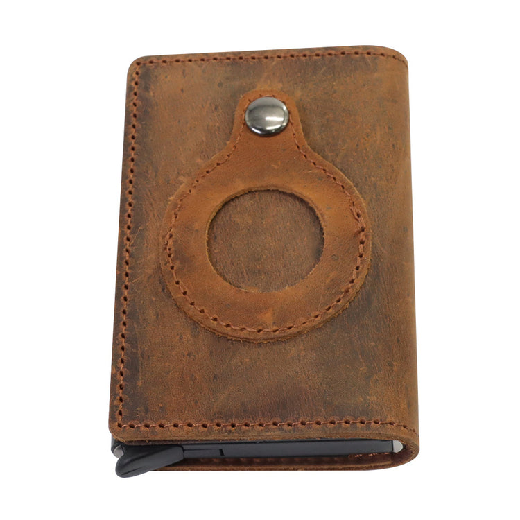 a brown leather wallet with a round circle