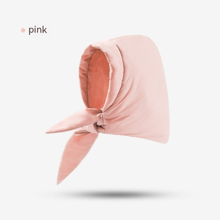 a pink scarf with a knot