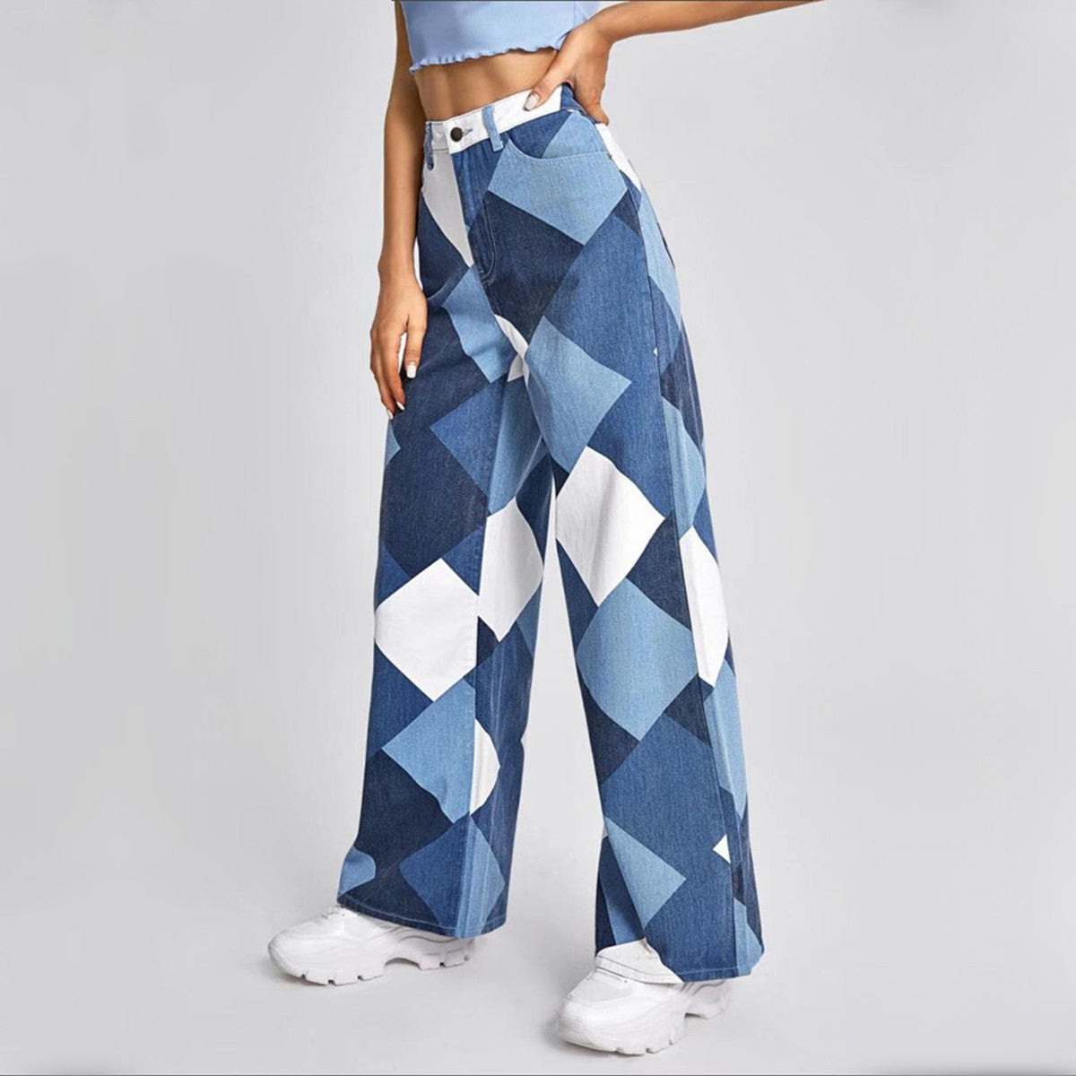 a person wearing blue and white checkered pants