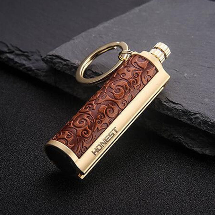 a key chain on a black surface