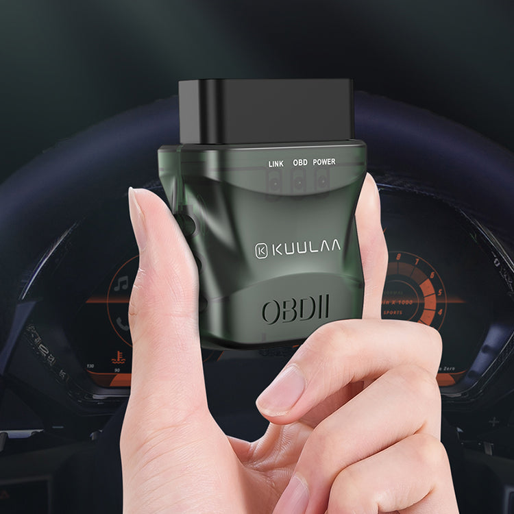 a hand holding a device