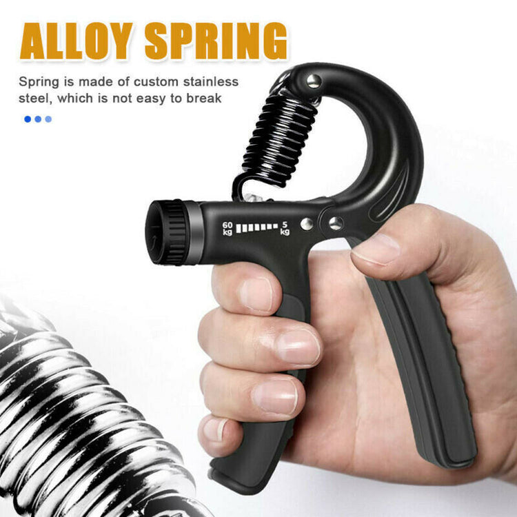 a hand holding a black hand grip
