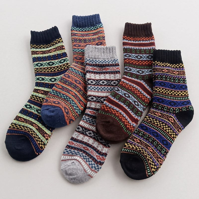 a group of socks on a white surface