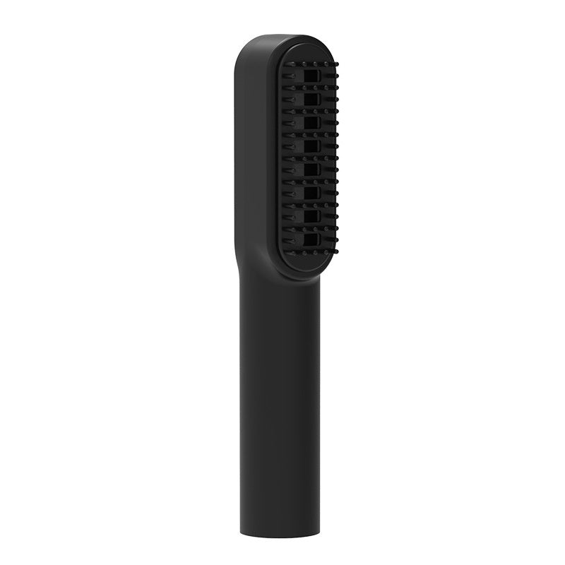 a black hair brush with a white background