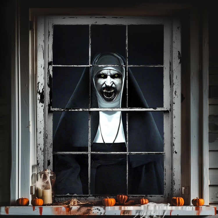 a person in a garment looking out a window