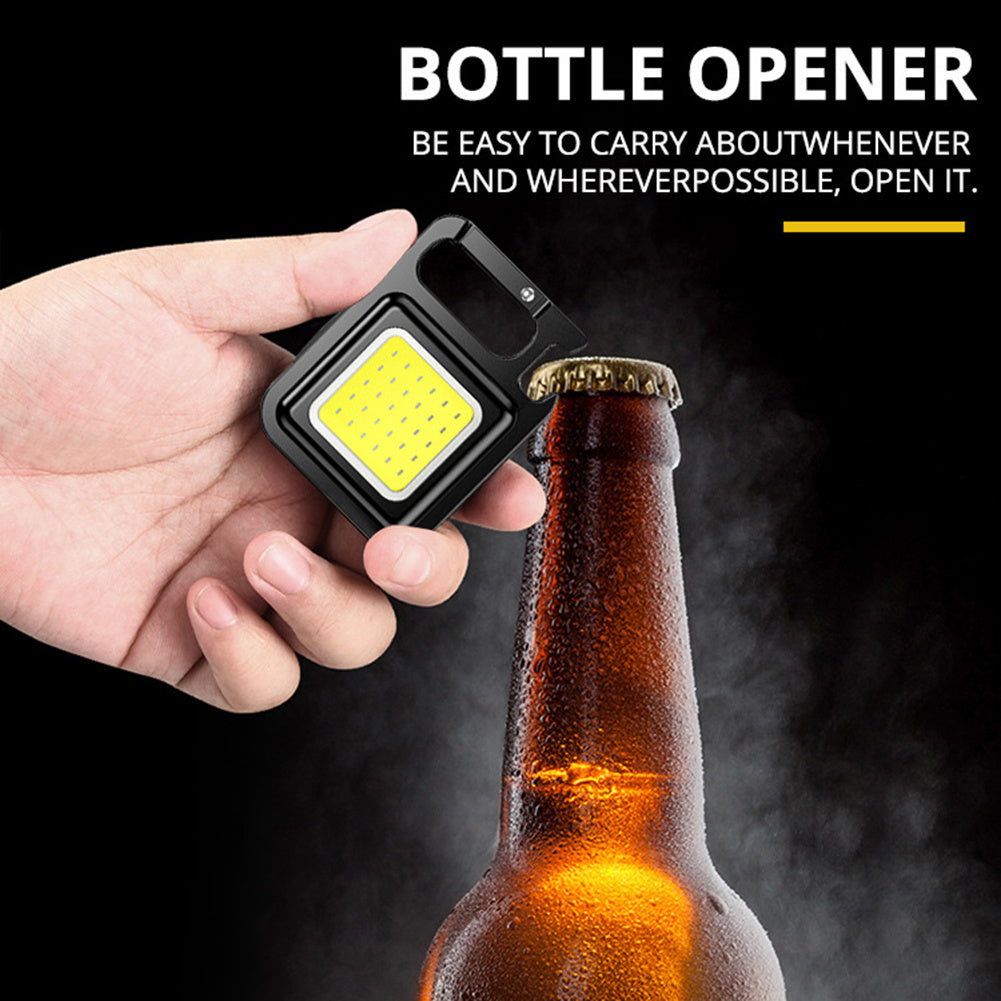 a hand holding a light up bottle