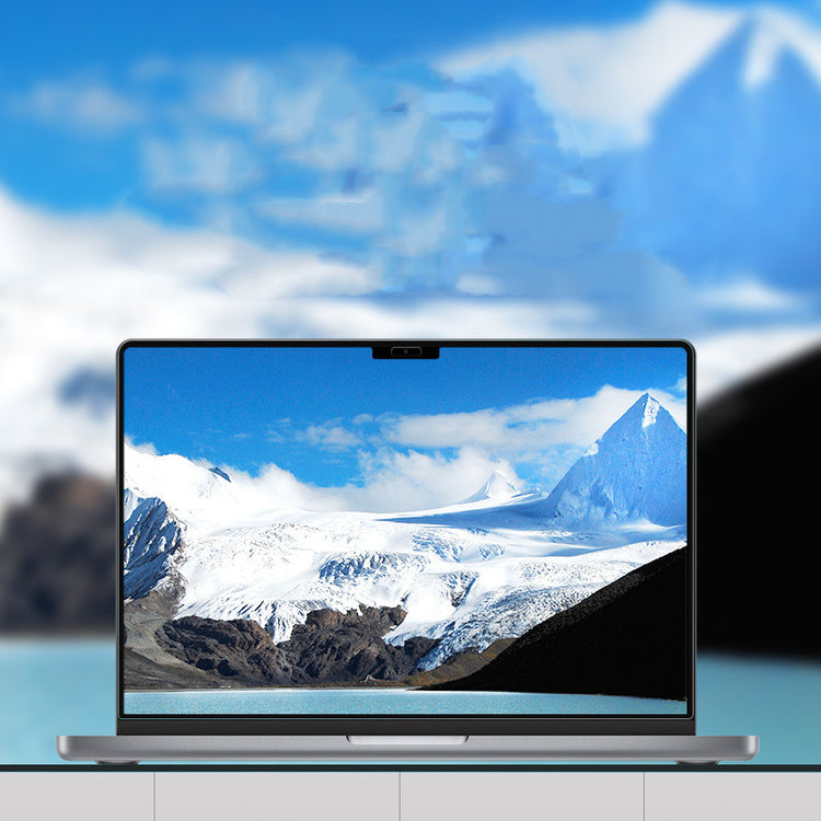 a laptop with a snowy mountain and blue sky