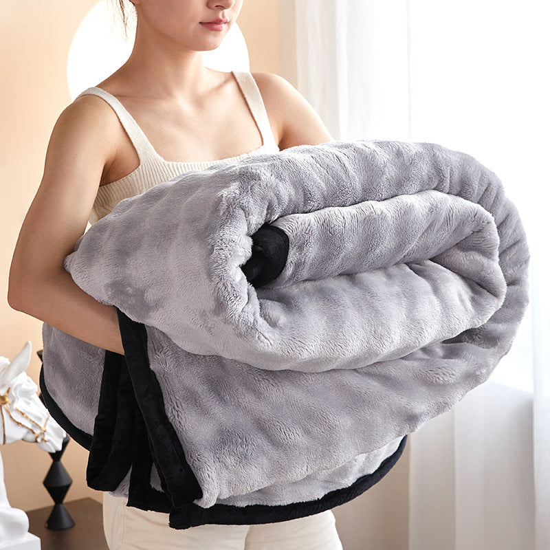 a woman holding a blanket