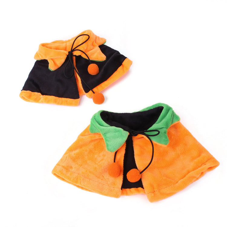 a pair of orange and black ponchos