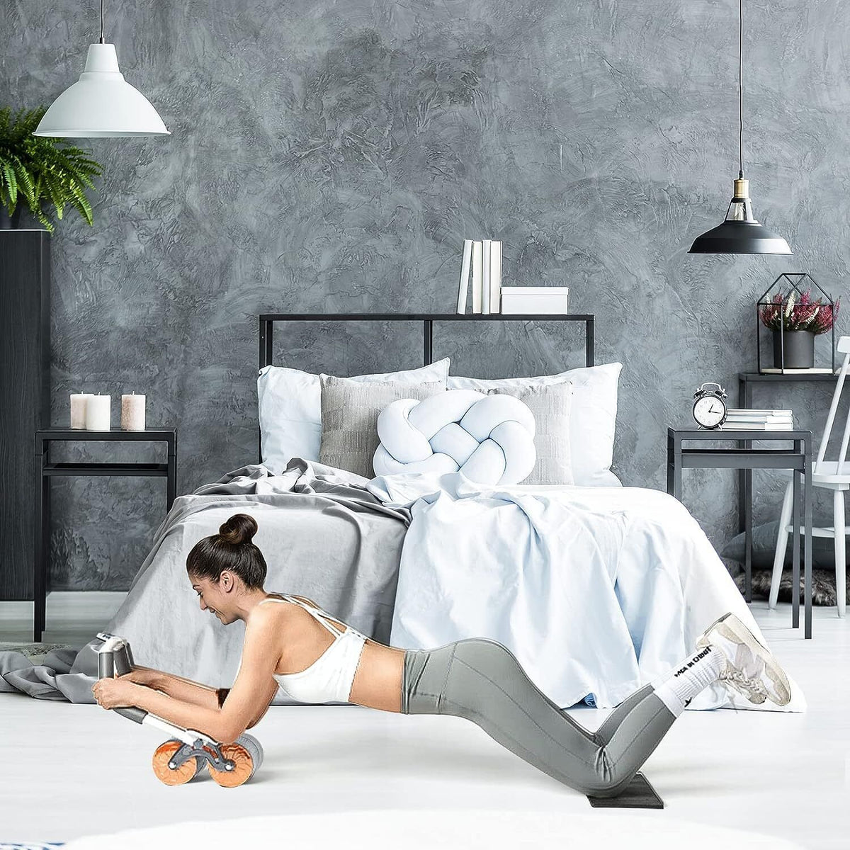 a woman doing push ups in a bedroom