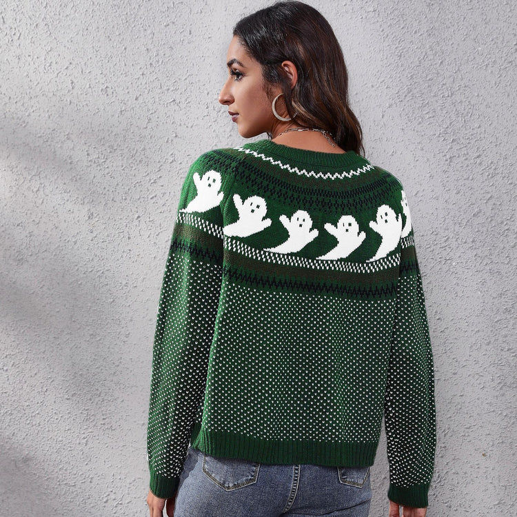 a woman wearing a green and white sweater