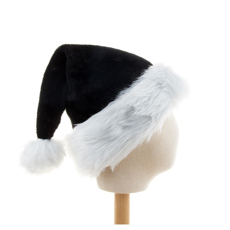 a black and white hat on a mannequin head