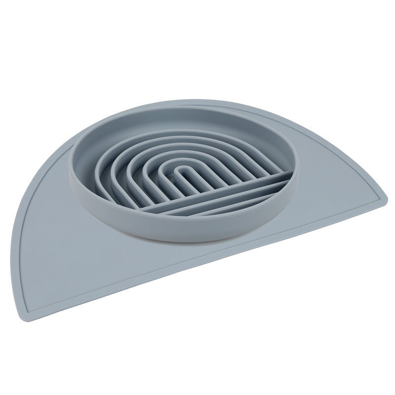 a grey circular object with a curved edge