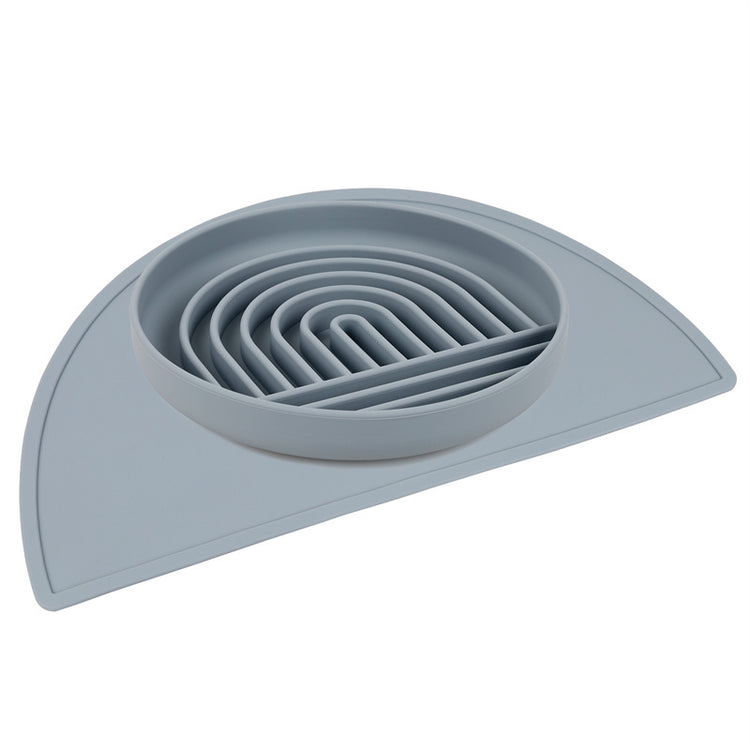a grey circular object with a curved edge
