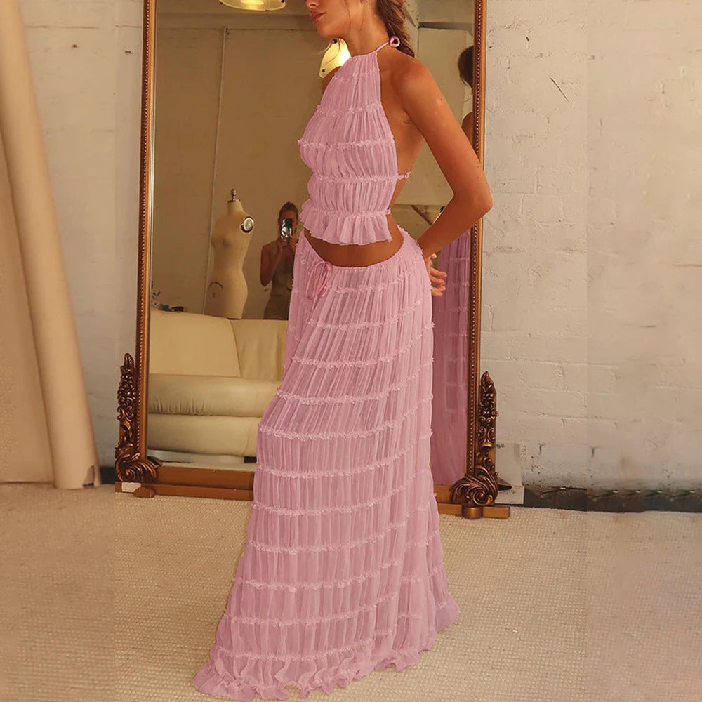 a woman in a pink dress