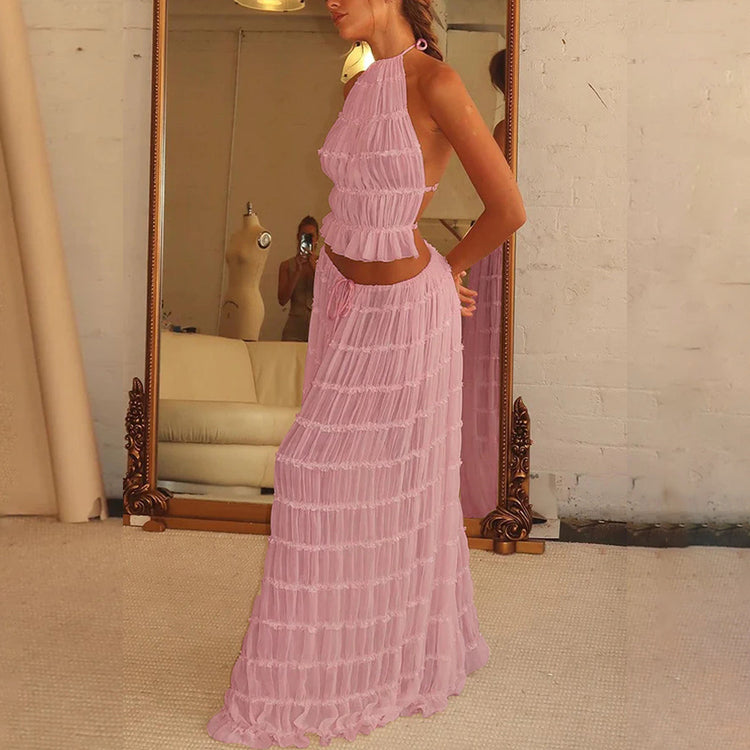 a woman in a pink dress