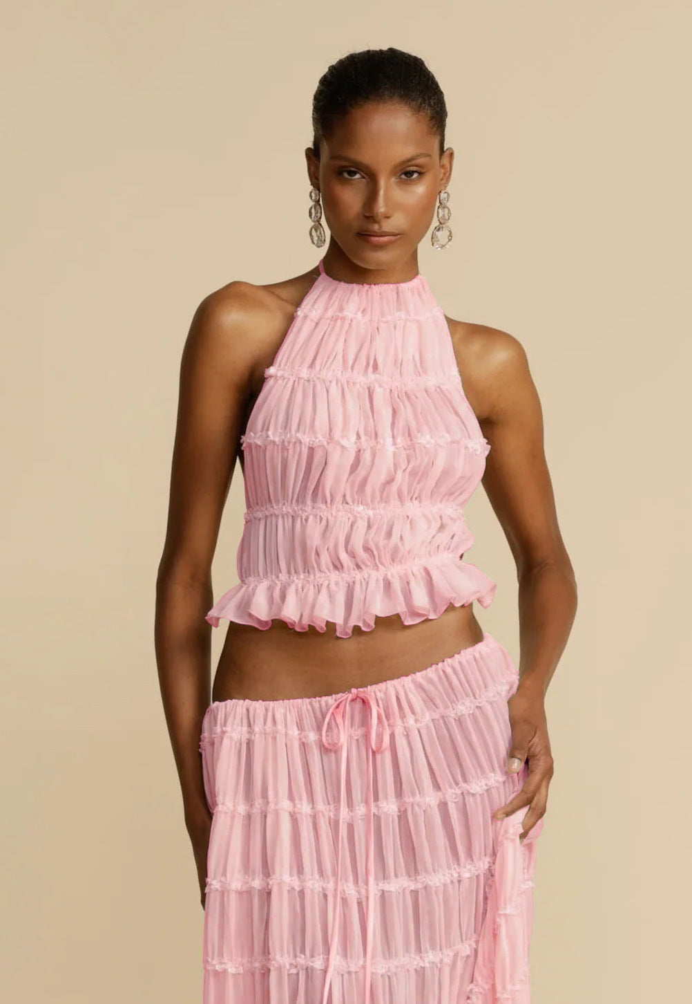 a woman in a pink dress