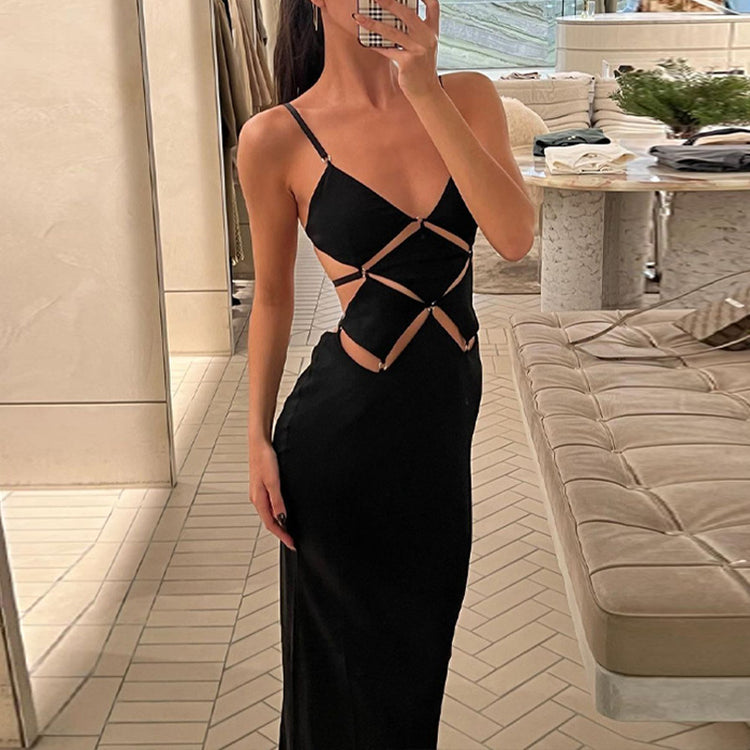 a woman taking a selfie in a black dress