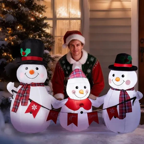 a man standing in front of a snowman