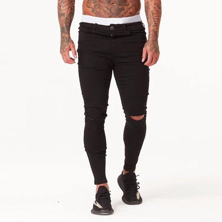 a man with tattoos on his stomach