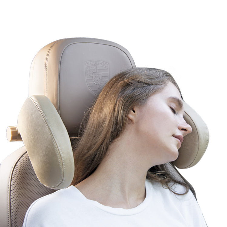 a woman sleeping on a car seat
