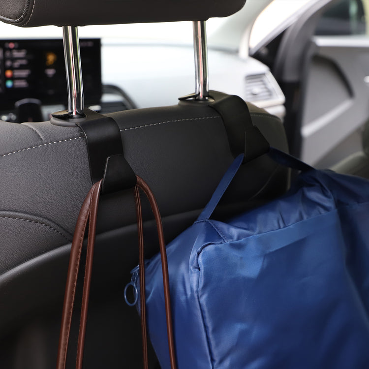 a bag from a headrest in a car