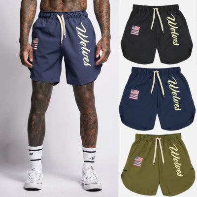 a man wearing shorts with a tattoo on his body