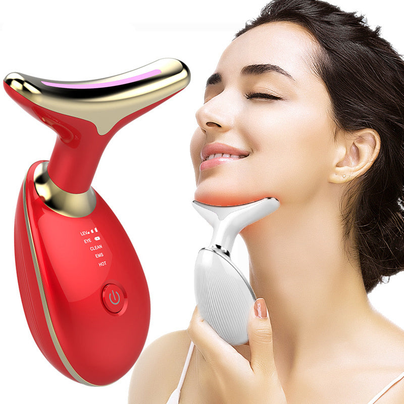 a woman holding a device to her face
