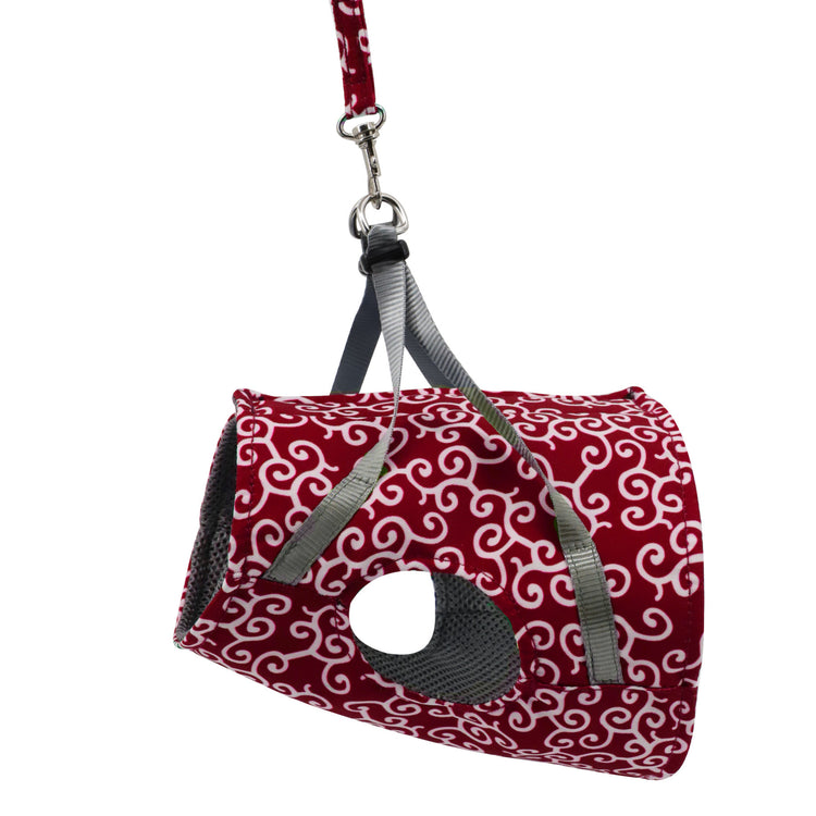 a red and white pet carrier