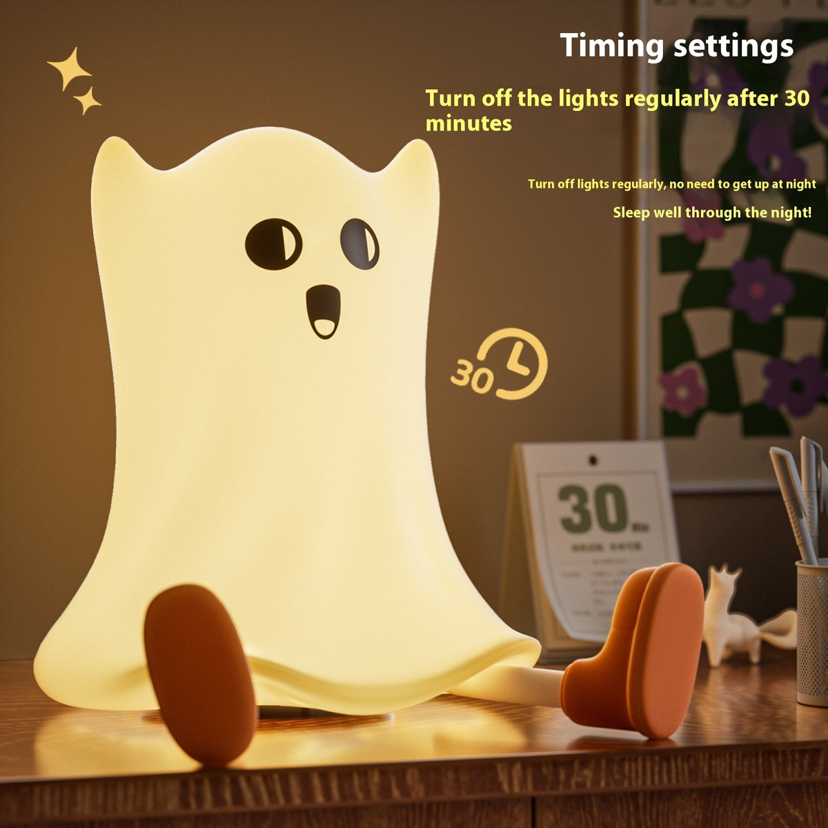 a glowing toy ghost on a desk