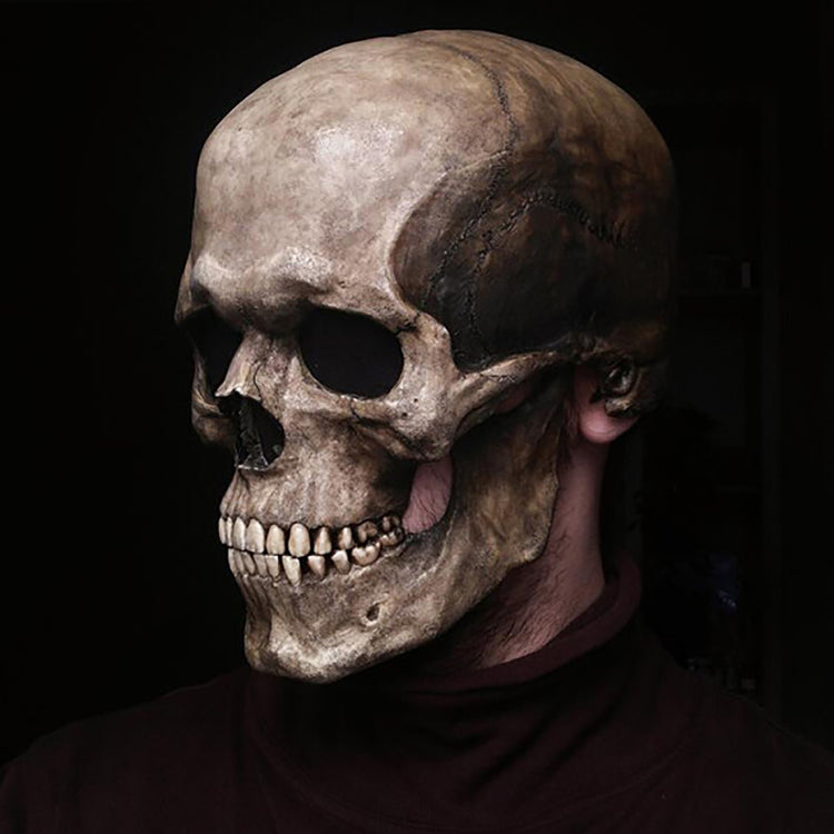 a man wearing a skull mask