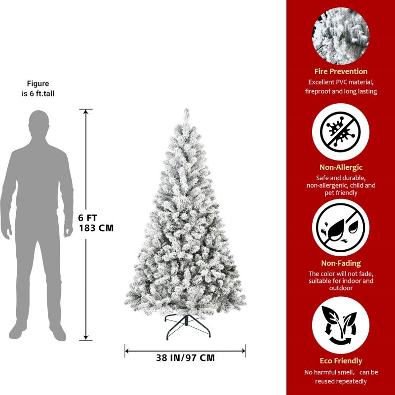 a man standing next to a christmas tree