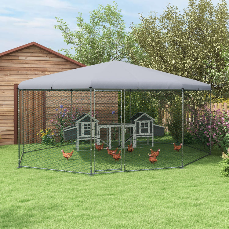 a chicken coop in a backyard