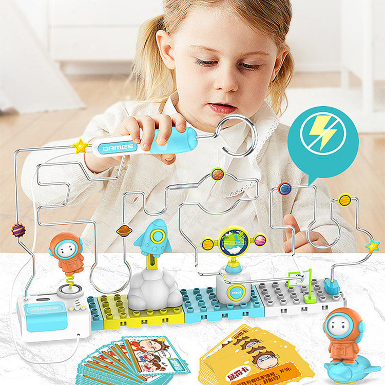 a girl playing with a game