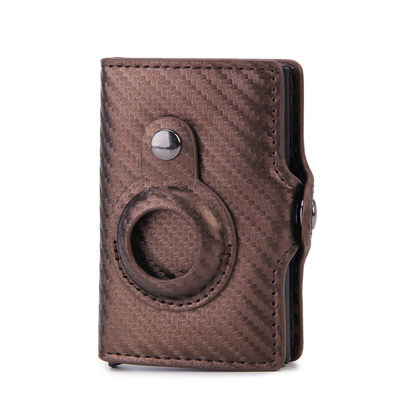 a brown leather wallet with a circular ring