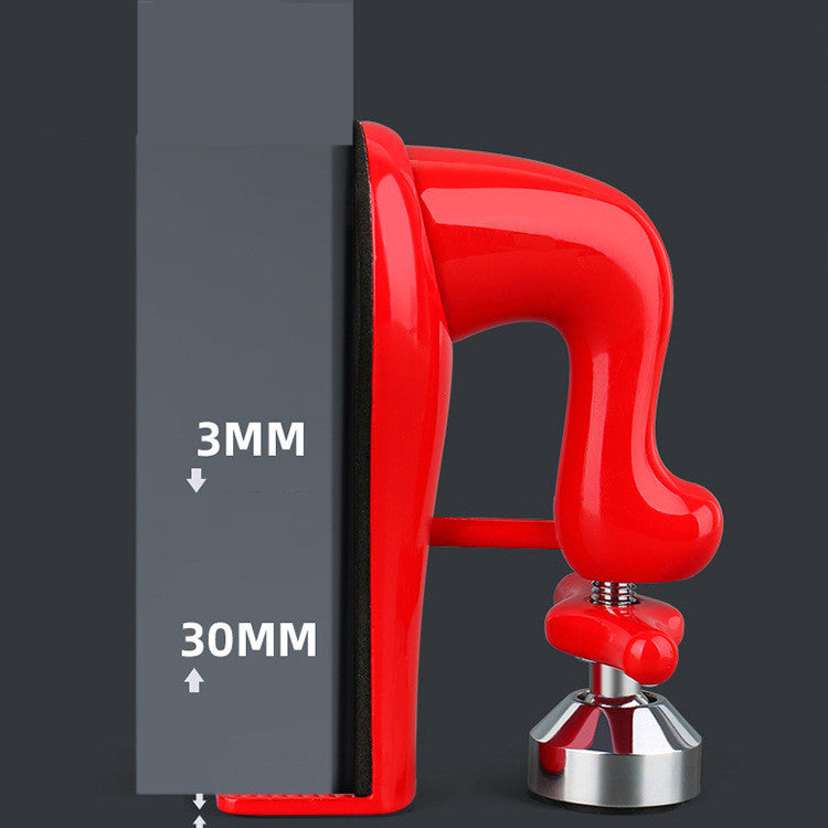 a red object with a metal object on it
